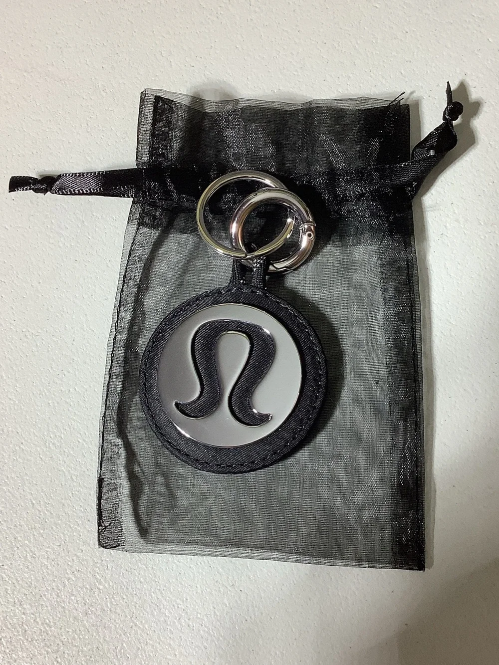 Lululemon black and silver logo Love keychain, new without tags